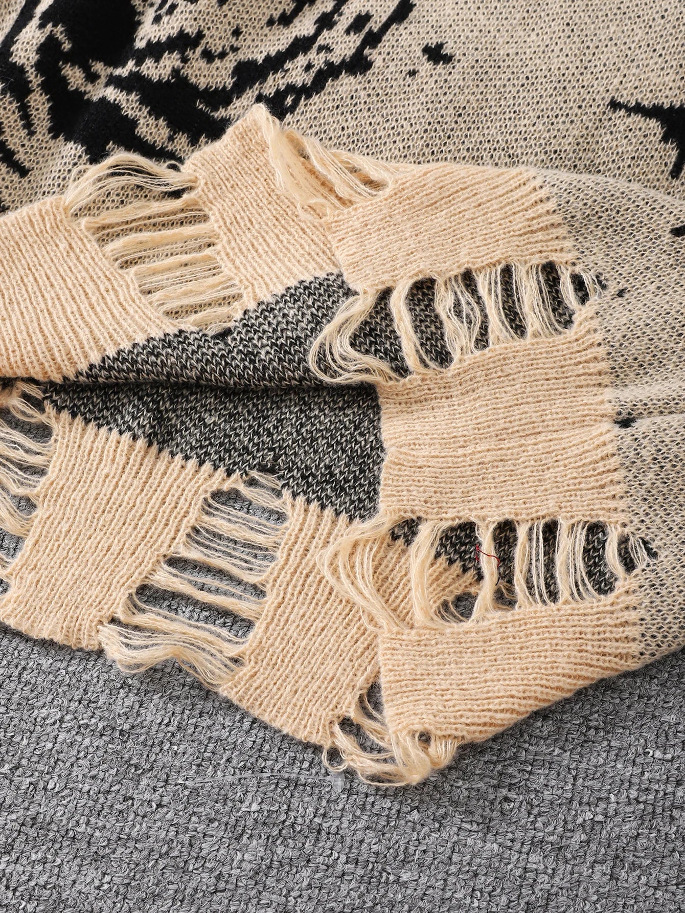 The Torn Galaxy Sweater