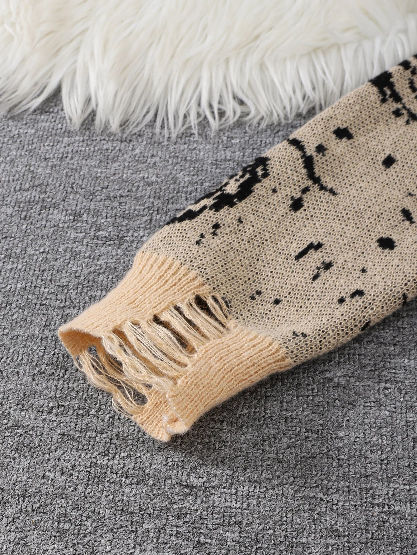 The Torn Galaxy Sweater